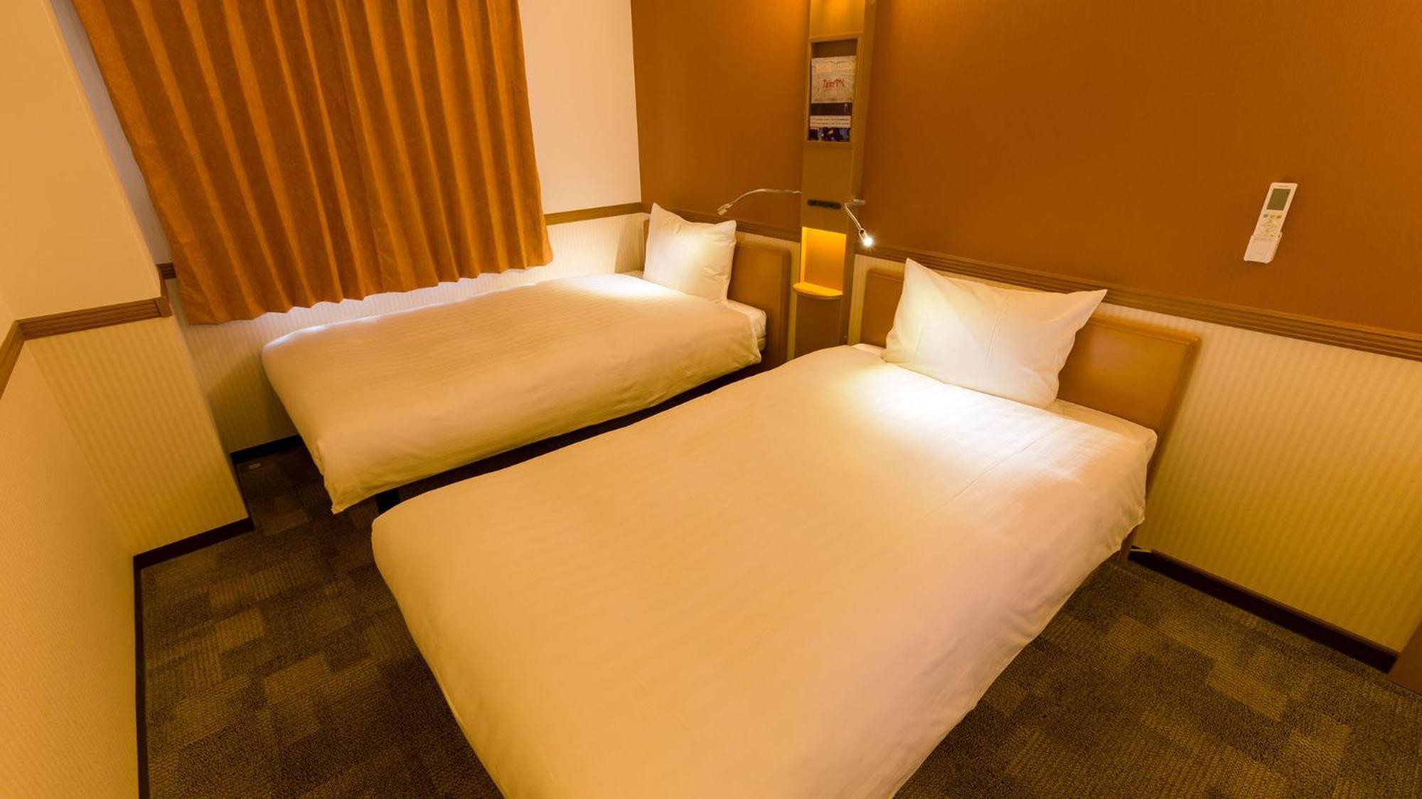 Toyoko Inn Takasaki Eki Nishi Guchi No 2 Rum bild
