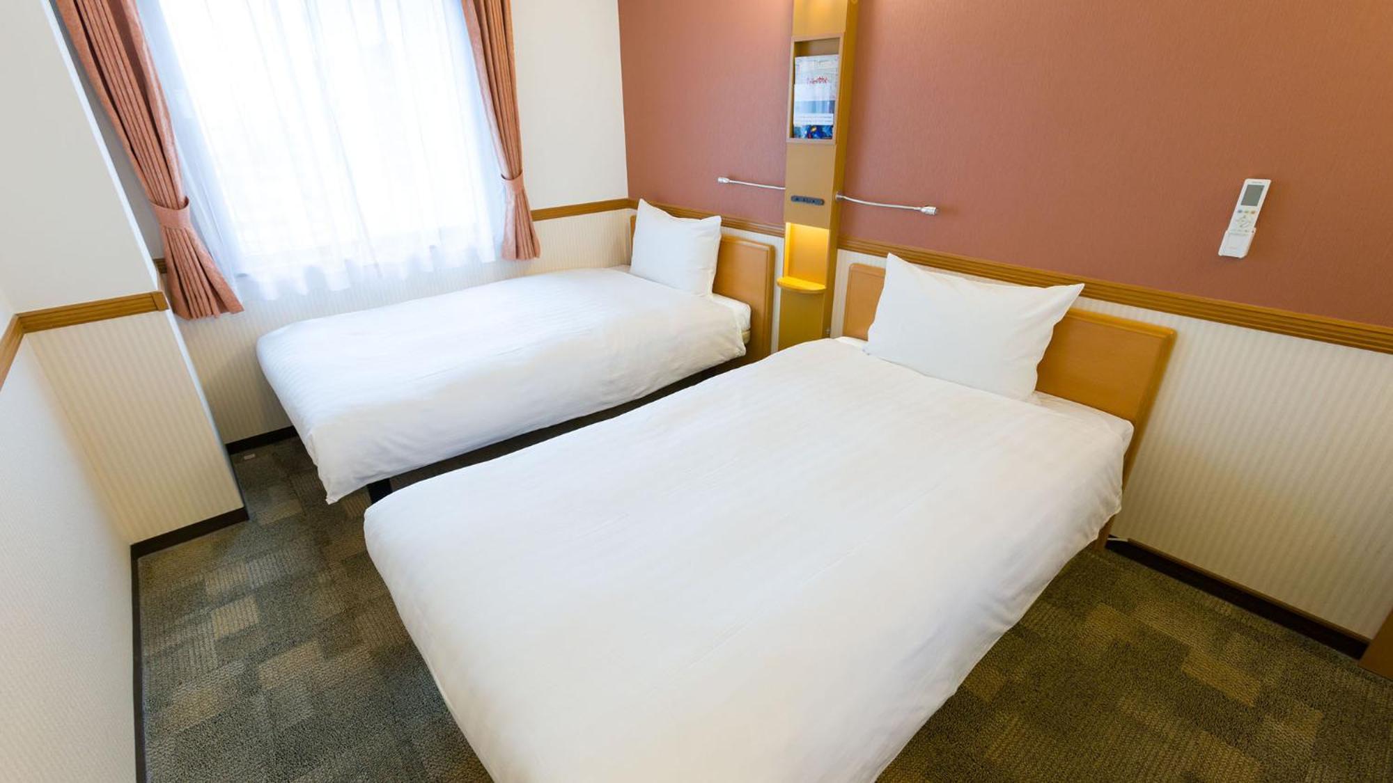 Toyoko Inn Takasaki Eki Nishi Guchi No 2 Rum bild