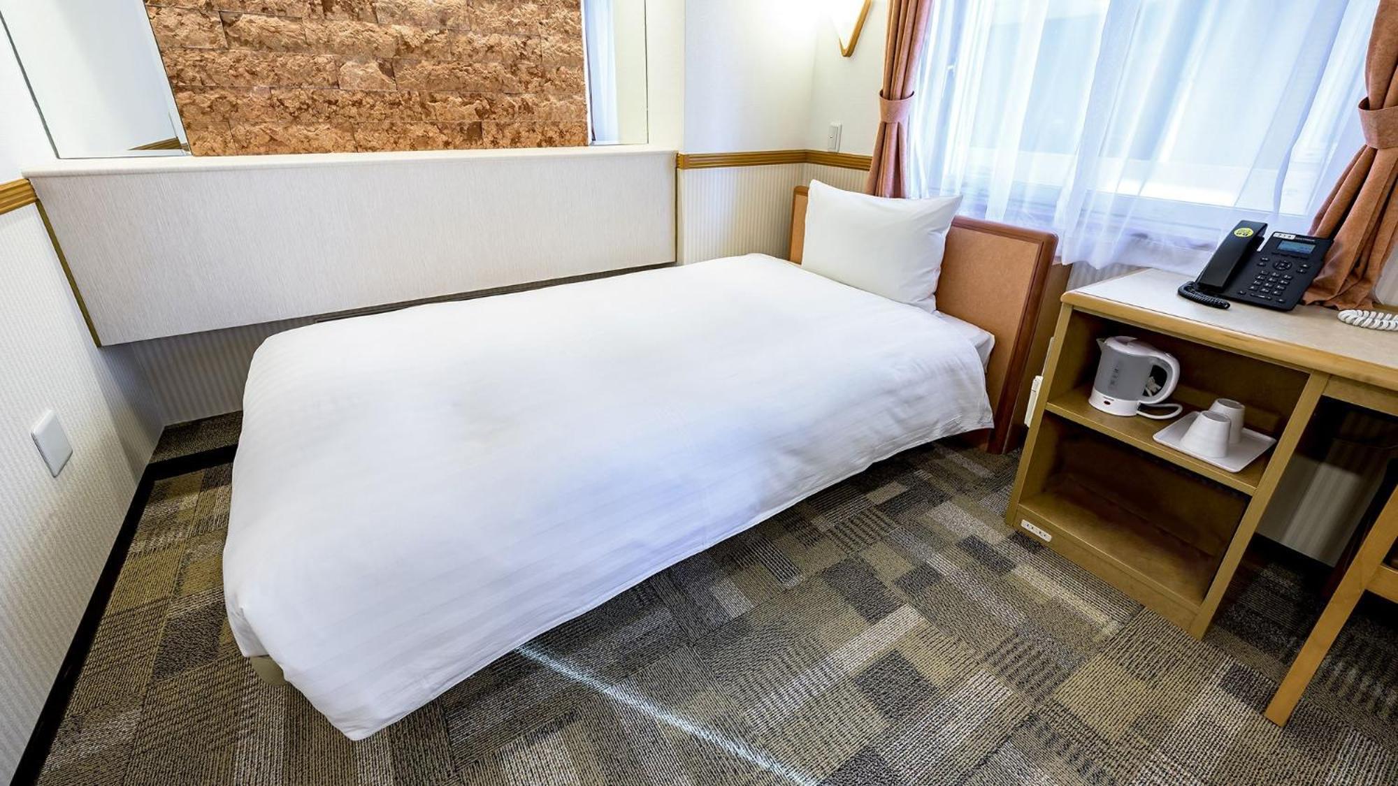 Toyoko Inn Takasaki Eki Nishi Guchi No 2 Rum bild