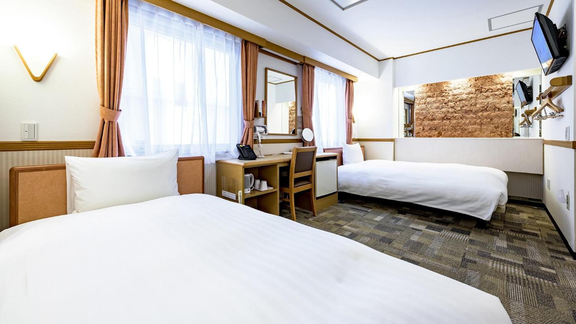 Toyoko Inn Takasaki Eki Nishi Guchi No 2 Rum bild